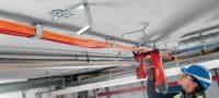 Gehen Sie zu Folie 3 von 7: X-ECH-FE MX Metall-Kabelhalter Metallsammelbehälter zur Verwendung mit magazinierten Nägeln oder Dübeln in Decken oder Wänden Anwendungen 1