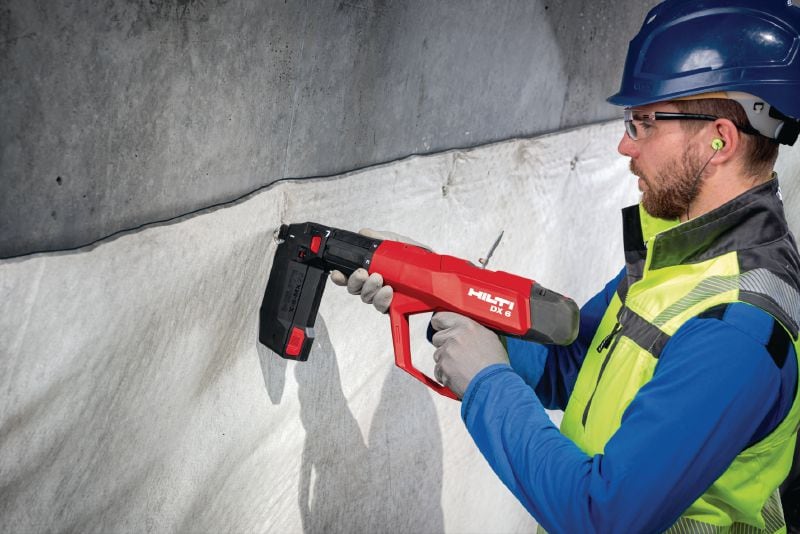 DX 6 MX pulverbetriebenes Gerät mit Magazin Vollautomatisches, pulverbetriebenes Bolzensetzgerät mit Magazin für magazinierte Nägel Anwendungen 1
