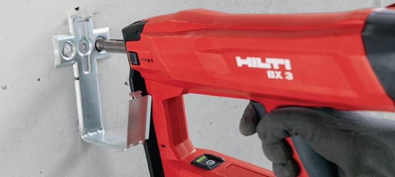 Bild 6 von 7: X-ECH-FE MX Metall-Kabelhalter Metallsammelbehälter zur Verwendung mit magazinierten Nägeln oder Dübeln in Decken oder Wänden Anwendungen 1